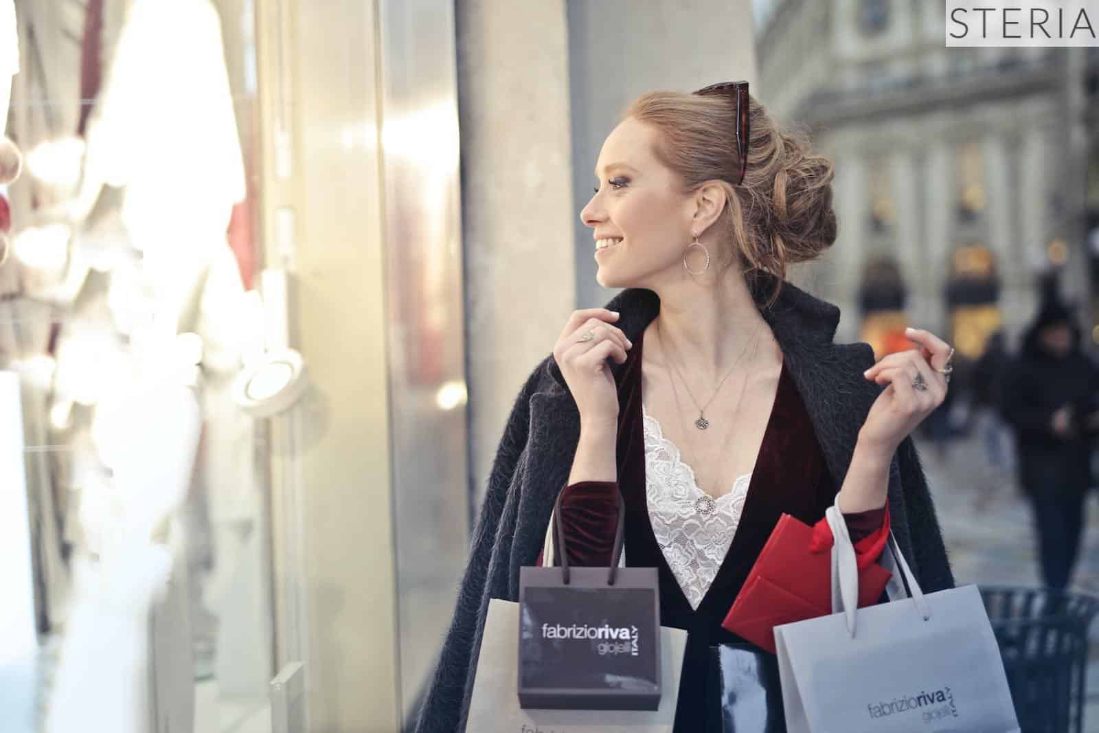 Woman Wearing Black Blazer Holding Shopping Bags